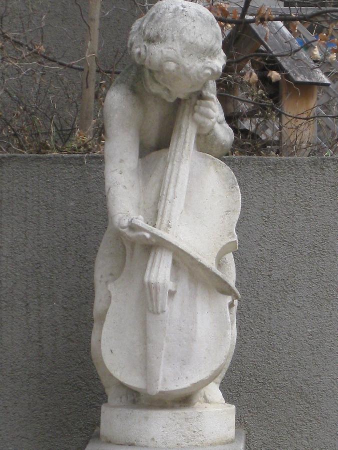 Musizierende Putto (links)