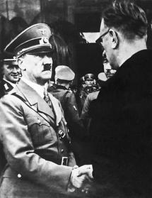 Adolf Hitler begrüßt Arthur Seyß-Inquart