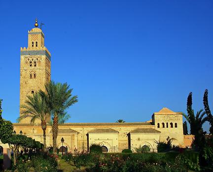 Koutoubia Mosque, the largest mosque in Marrakech. It is located in the southwest medina quarter of Marrakesh. It is ornamented with curved windows, a band of ceramic inlay, pointed merlons, and decorative arches; it has a large plaza with gardens, and is floodlit at night. The minaret is 77 metres high. It was completed before 1200. Photo: pixabay.com 