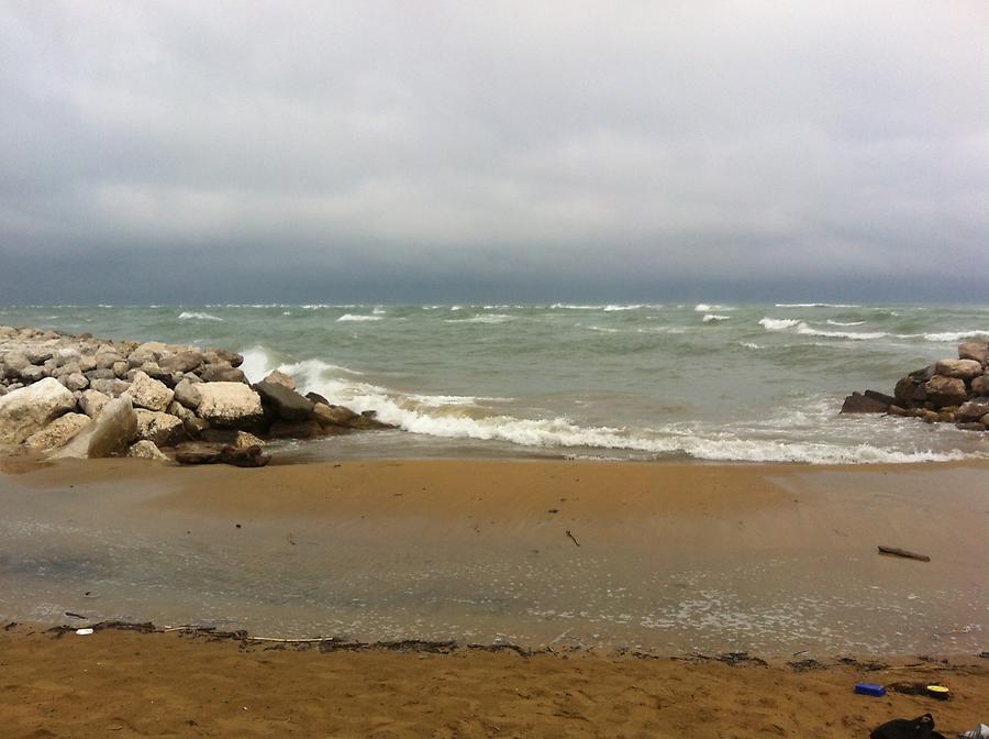 high waves and dark clouds