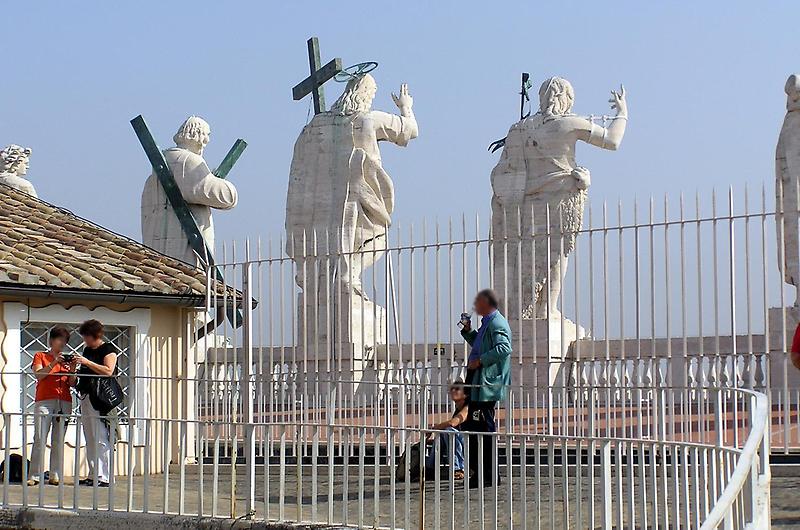 Behind the statues