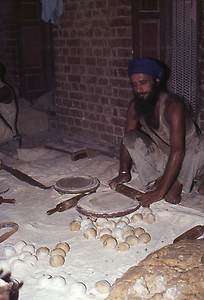 Volunteers are preparing flatbread