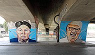 Lush-Sux-Graffiti nördlicher Pfeiler: Trump und Kim (August 2017)