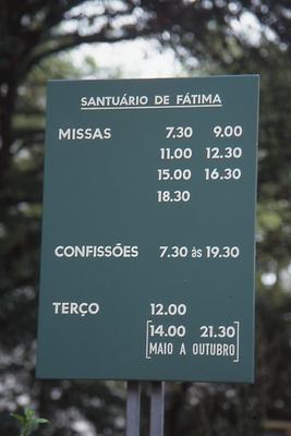 Sign indicating masses and possibilities to go to confession