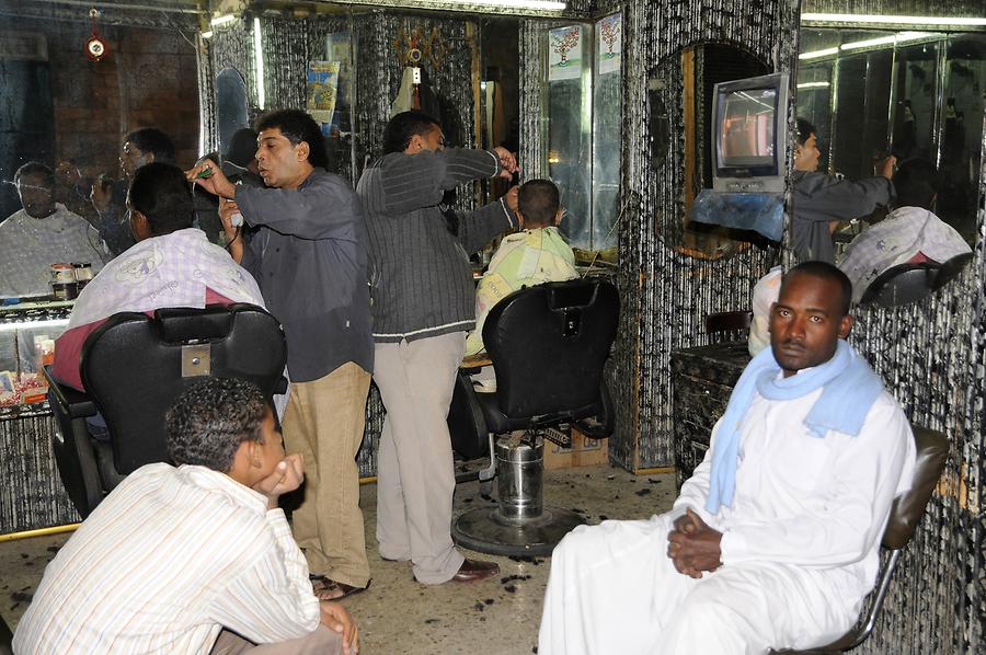 Aswan - Market at Night; Hairdresser