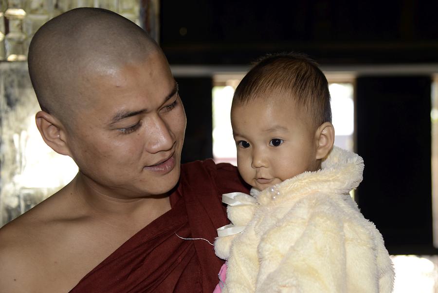 Monk with child