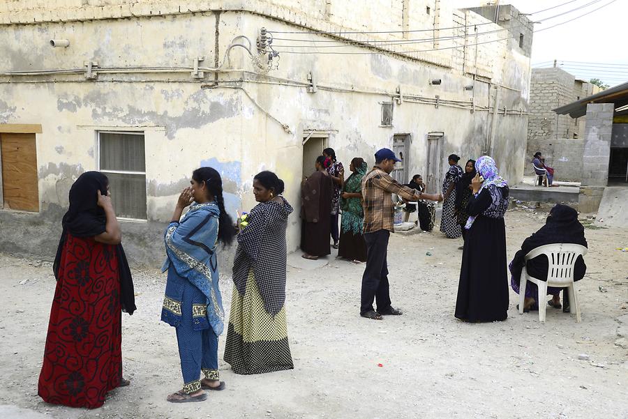 Mirbat - Street Scene; Women