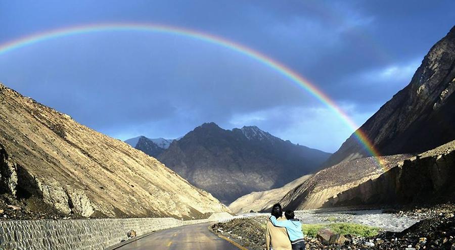 Rainbow enhances the scenic landscape