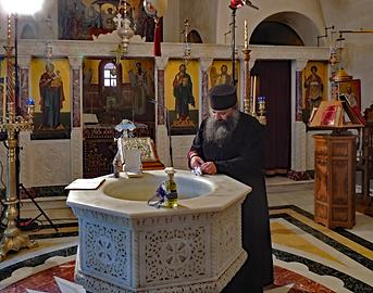 The pope prepares for a baptism