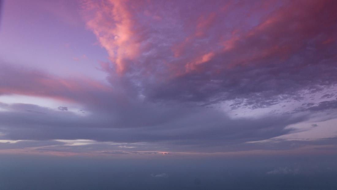 Admiring the colorful and mystical sunsets, Mirador de la Pena viewpoint, El Hierro, Canary Islands, Spain, ©Natalia Zmajkovicova