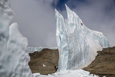 Will Gadd ice climbing near the summit at 19,000 feet on the glacier ice on Mount Kilimanjaro in Tanzania