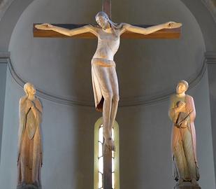 Romanische Kreuzigungsgruppe, um 1150, Hochaltarbereich, Basilika Seckau - Ausschnitt eines Fotos: Dnalor 01 / CC-BY-SA 3.0 / Wikimedia Commons - Gemeinfrei - Auffallend S-Form des Körpers; kein schmerzverzerrtes Gesicht und keine Wundmale, somit Hoffnung auf Auferstehung