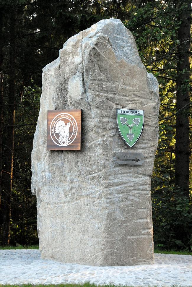 Ortseinfahrt - Stein mit Wappen