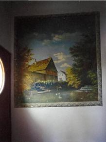 Wandmalerei im Eingangraum Mühle am Fluss.