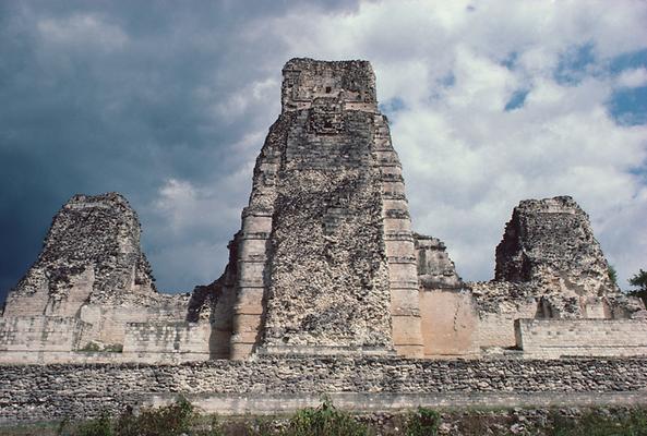 The main structure of Xpuhil with three dummy stairs and remnants of superimposed dummy temples.