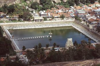 The entrance to the pond is through a Gopuram gateway of South Indian style