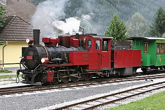 699.01 im roten Touristikbahnanstrich auf der Taurachbahn in Mauterndorf