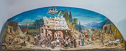 Weihnachtskrippe mit 50 Figuren, die Rudolf Moroder fūr seine Braut als Hochzeitsgeschenk 1910 geschnitzt hat. Die Krippe wurde von Josef Moroder Lusenberg, sein Onkel, bemahlt.