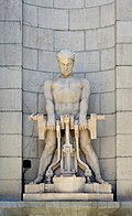 Allegorische Figur Dampf am Bahnhof Bozen