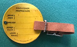 Gepäckanhänger (1892-1918) (Durchm. 50 mm, Druck: Gesellschaft für graphische Industrie Wien, VI.)