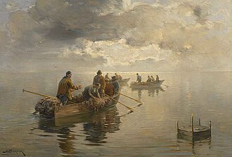 Chiemseefischer im dunstigen Licht am frühen Morgen