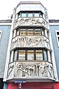 Hausfassade für den Architekten Zeytinoglu und die Caritas in der Adolf-Kolping-Gasse in Klagenfurt