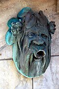 Brunnenmaske am Fluderbrunnen im Schillerpark, Klagenfurt