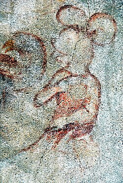 „Mickey Mouse“ auf dem Christophorus-Fresko an der Pfarrkirchen-Außenwand
