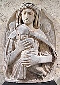Michelozzo (zugeschrieben), Maria mit Kind, c. 1440, Kalkstein mit Resten der Bemalung, 78×57×2 cm, Louvre (Inv. RF 693), Paris